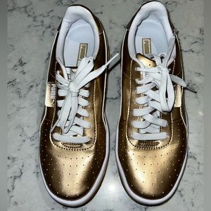 Puma gold sneakers
